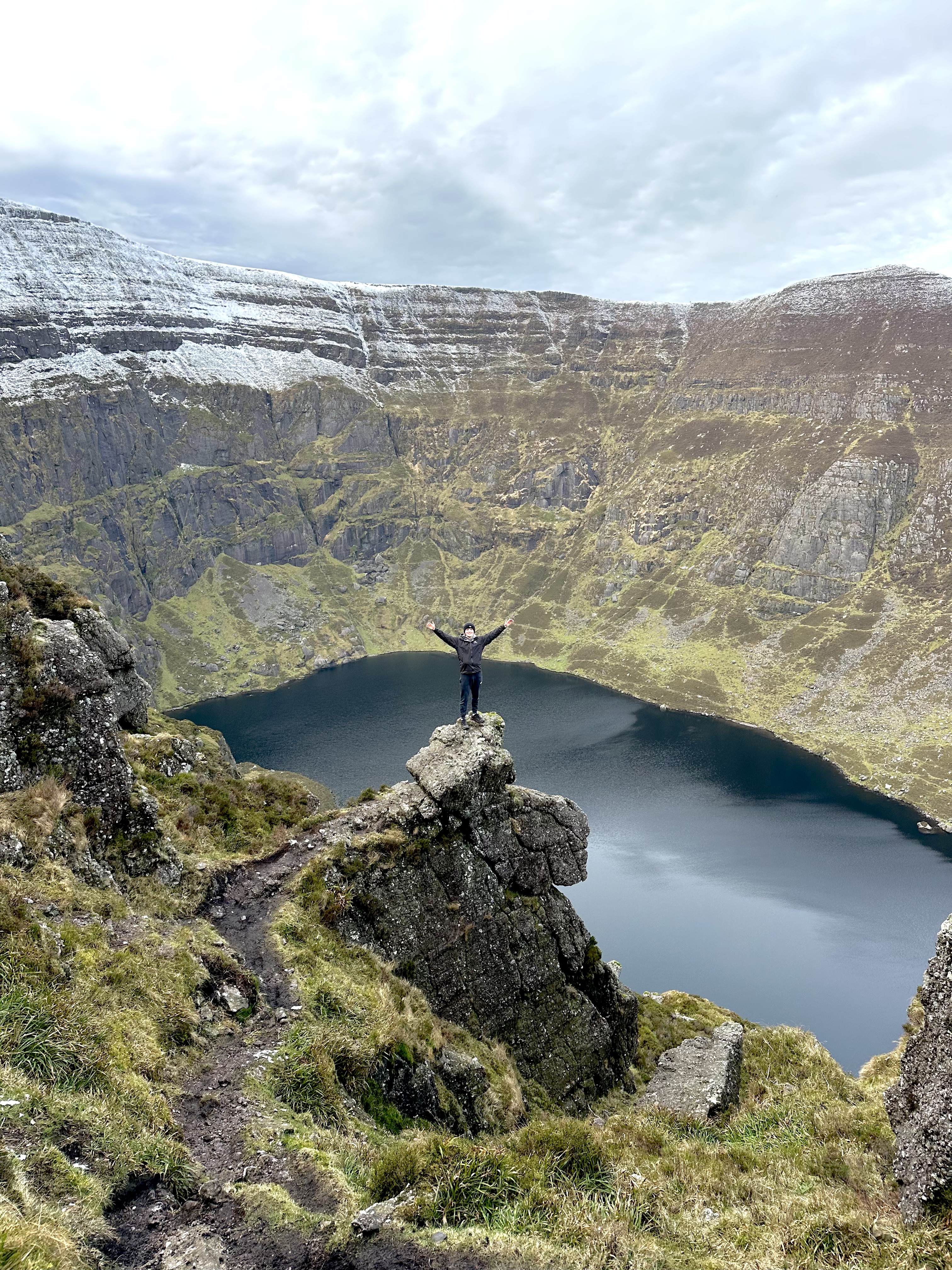 Dean Carter overlooking a mountain lake